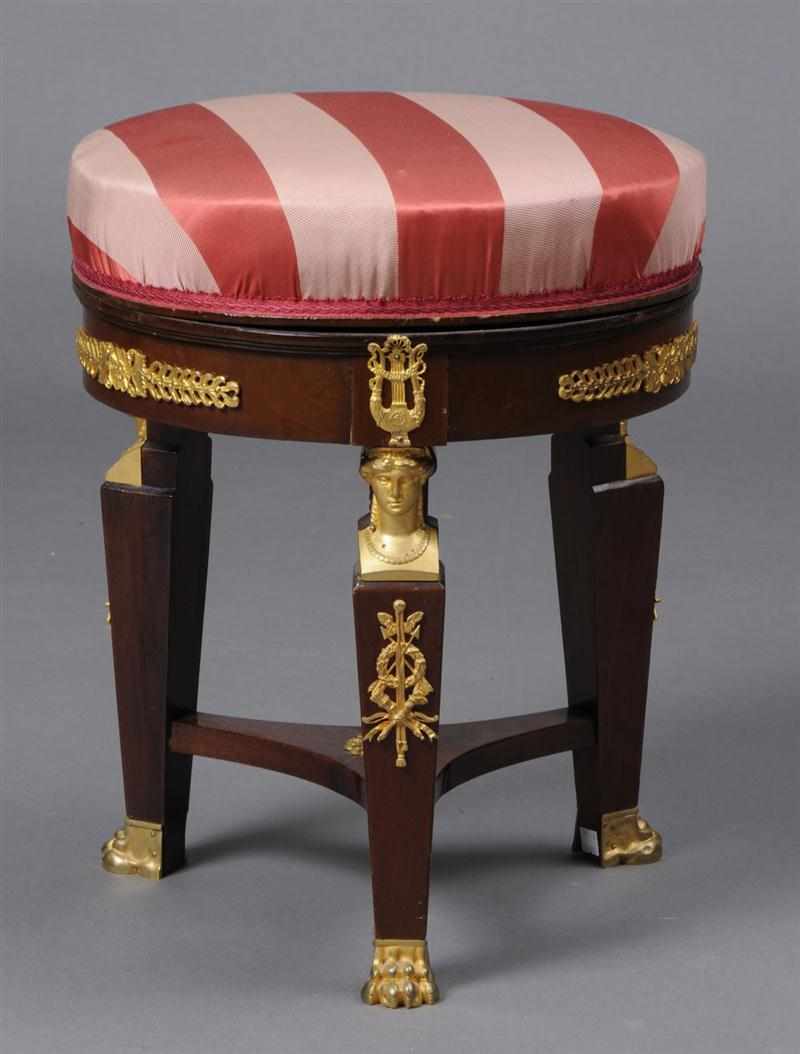 Appraisal: EMPIRE STYLE GILT-BRONZE MOUNTED MAHOGANY TABOURET The circular upholstered top