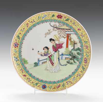 Appraisal: Famille Rose Footed Plate with Two Maidens Hand-painted porcelain plate