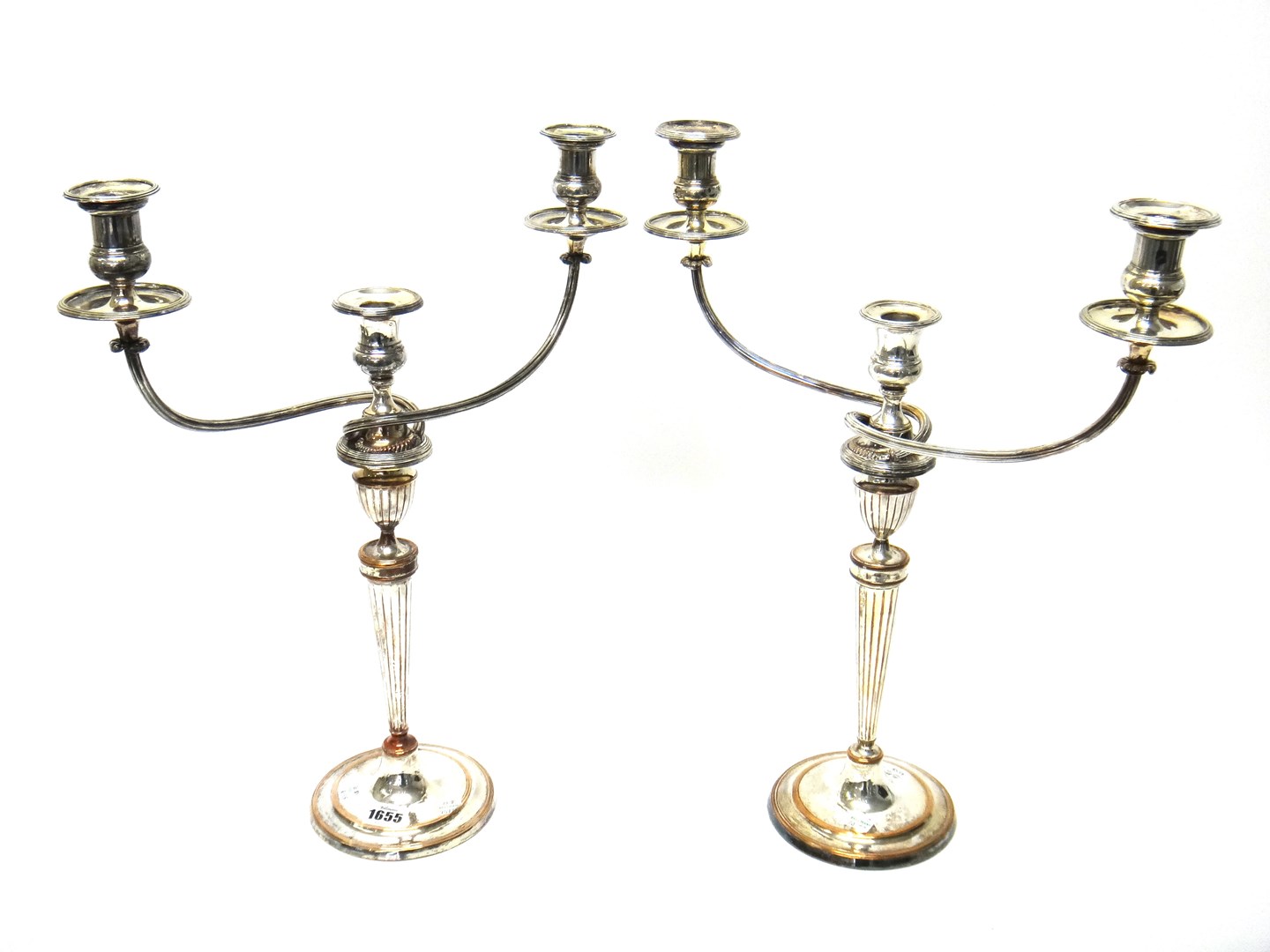 Appraisal: A pair of plated on copper three light table candelabra