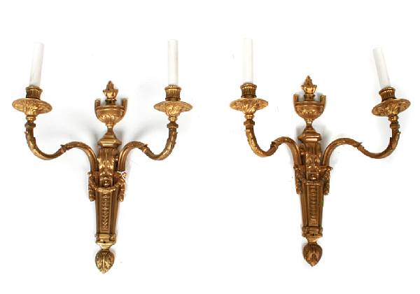 Appraisal: A pair of Louis XVI style gilt bronze sconces height