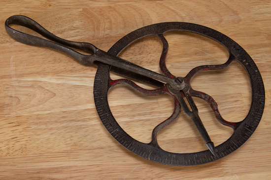 Appraisal: Antique iron Wheel Wright used by blacksmiths for measuring wagon