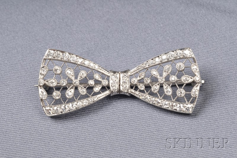 Appraisal: Edwardian Platinum and Diamond Bow Brooch T B Starr the