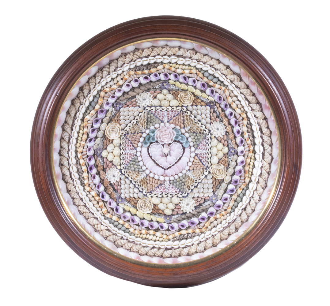 Appraisal: FRAMED SAILOR'S VALENTINE Large Round Shell Work Valentine with artfully