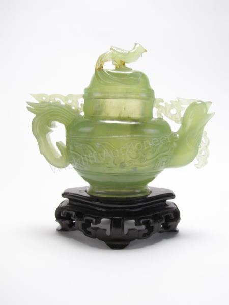 Appraisal: Oriental Jade Teapot green jade with carved bird decoration lid