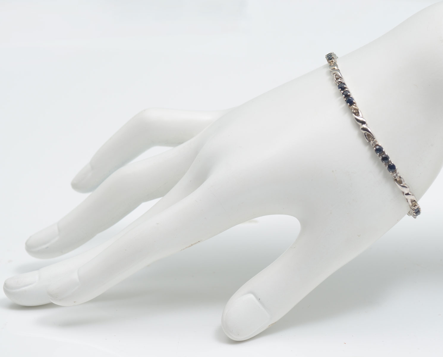 Appraisal: K CTW SAPPHIRE BRACELET K white gold bracelet contains round