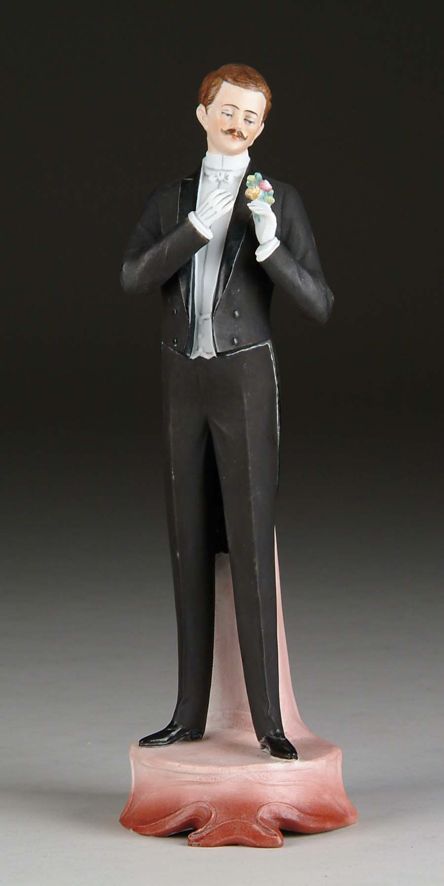 Appraisal: BISQUE FIGURINE OF EDWARDIAN GENTLEMAN t including base this bisque