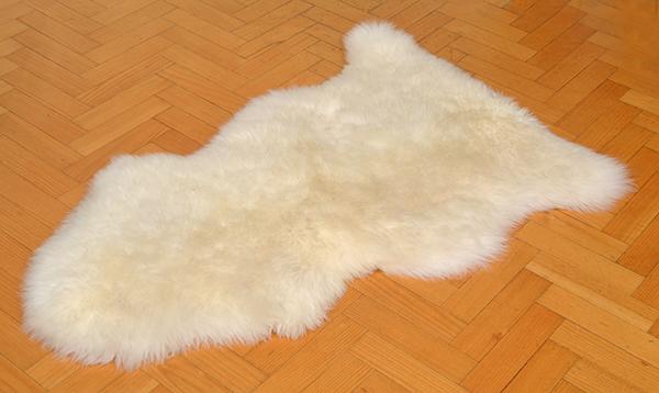 Appraisal: SMALL SHEEP SKIN RUG CM WIDE