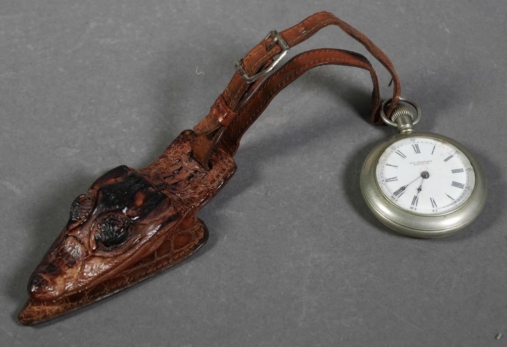 Appraisal: Old Florida gator watch fob attached to leather strap holding