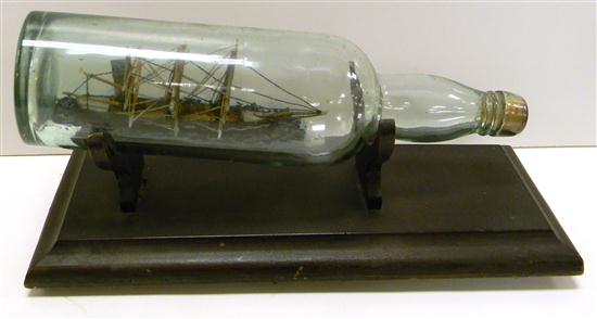 Appraisal: SHIP MODEL Ship in bottle three masted on wooden stand