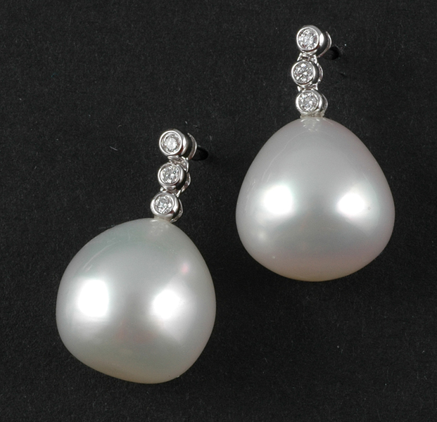 Appraisal: A PAIR OF SOUTH SEA PEARL AND DIAMOND DROP EARRINGS