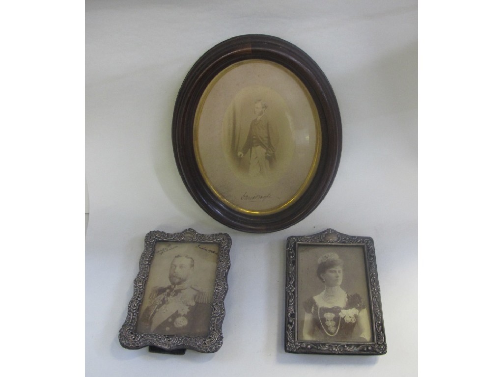 Appraisal: Lot comprising two Royal portrait prints in white metal frames