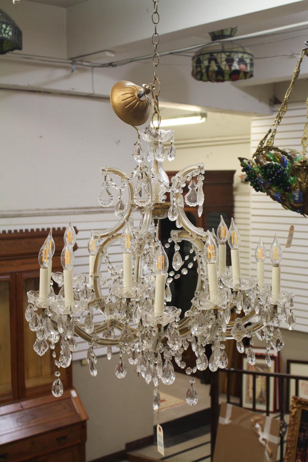 Appraisal: SIXTEEN-LIGHT CRYSTAL CHANDELIER L x D