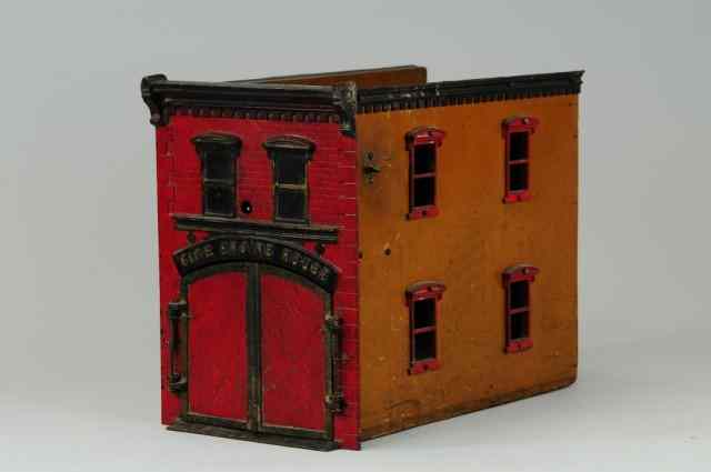 Appraisal: CLOCKWORK FIRE ENGINE HOUSE Ives c well scaled with exceptional