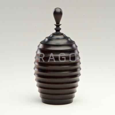 Appraisal: STUDIO Turned and lidded ebony wood vessel th c Unmarked