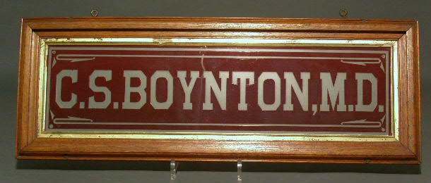 Appraisal: Glass sign in a walnut frame Dr Boynton x