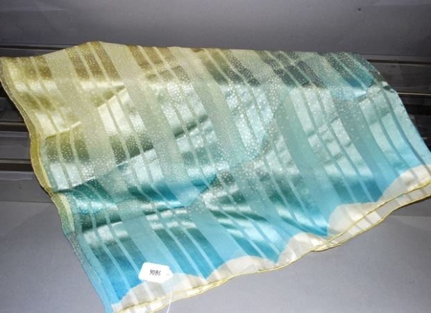 Appraisal: Yellow blue graduated print silk scarf - no label Approx