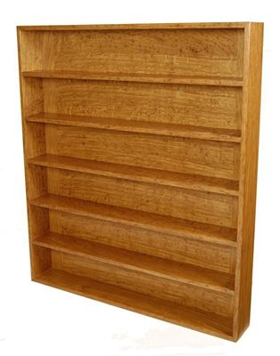 Appraisal: A Matthew Burt tigered oak wall shelf unit six shelves