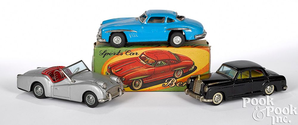 Appraisal: Three Japanese tin friction cars Three Japanese tin friction cars