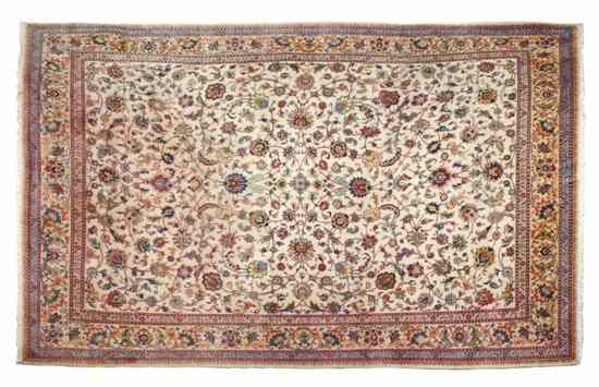 Appraisal: A Persian Wool Carpet modern having allover foliate decoration on