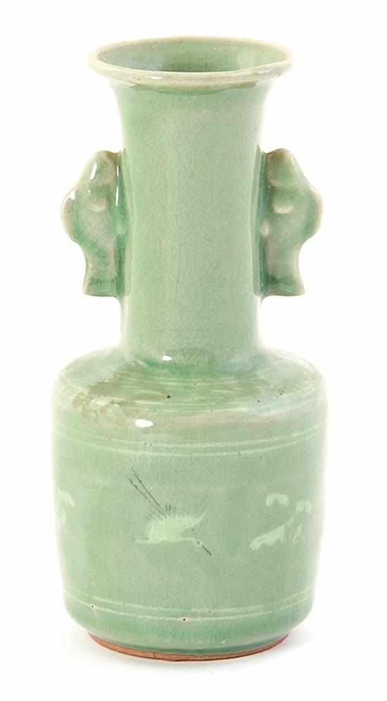 Appraisal: Korean celadon vase th century mallet-form vessel with fish-form handles