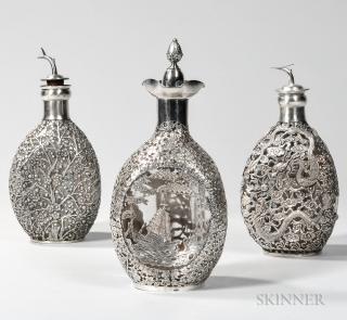 Appraisal: Three Chinese Export Silver-mounted Pinch Bottles one with cherry blossom