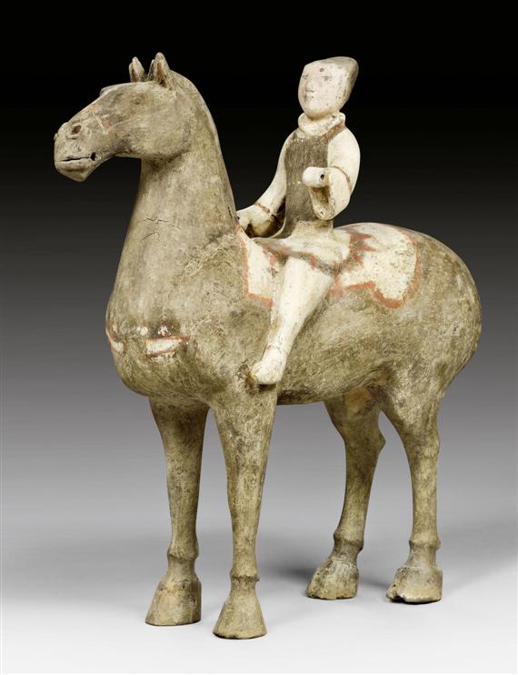 Appraisal: A FINE PAINTED TERRACOTTA HORSE AND RIDER China Han dynasty