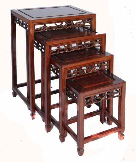 Appraisal: A QUARTETO OF CHINESE HARDWOOD OCCASIONAL TABLES each with carved