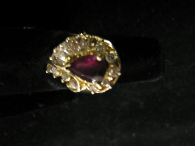 Appraisal: Ruby Diamond Ring pear shape carat gem surrounded by round