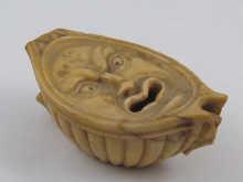 Appraisal: A carved marble oil lamp the top carved in a