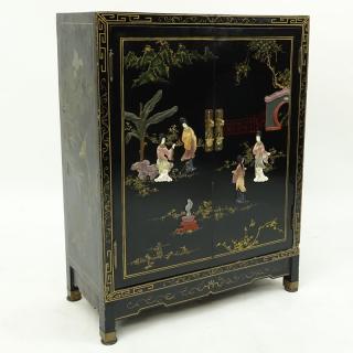 Appraisal: Mid Century Chinese Lacquered Cabinet Decorated with figural appliques Unsigned