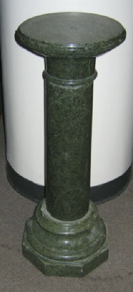 Appraisal: CONTINENTAL GREEN MARBLE PEDESTAL With circular top on the tapering