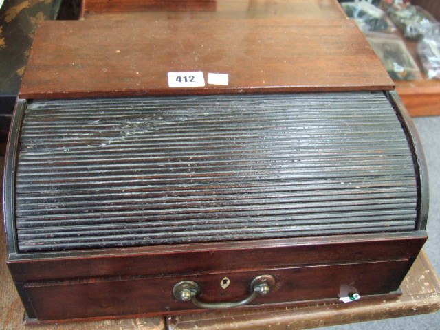 Appraisal: An early th century mahogany tambour front travelling writing box