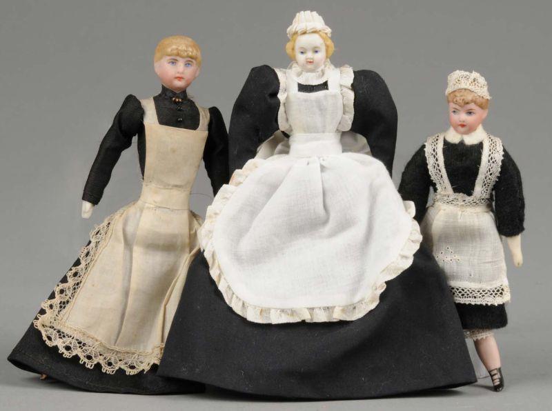 Appraisal: Three Dollhouse Servants Germany early th century three dollhouse maids