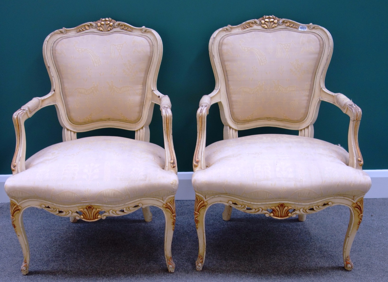 Appraisal: A pair of th century French style cream painted and