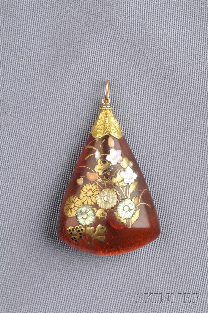 Appraisal: Inlaid Amber Pendant China decorated with sprays of flowers in