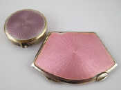 Appraisal: Two enamelled engine turned silver powder compacts one fan shaped