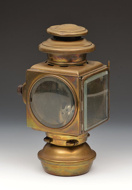 Appraisal: AN EARLY TH CENTURY AMERICAN BRASS AUTOMOBILE SIDE-LAMP possibly for