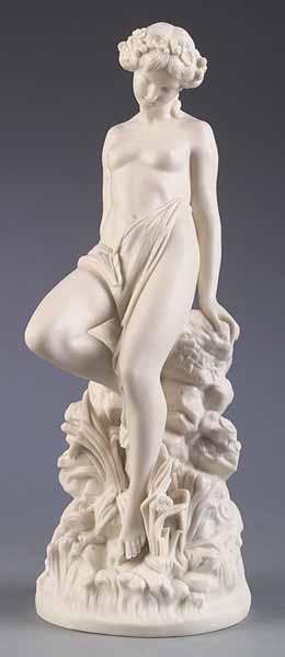 Appraisal: A Bisque Porcelain Nude Figure of a Nymph Amid Cattails