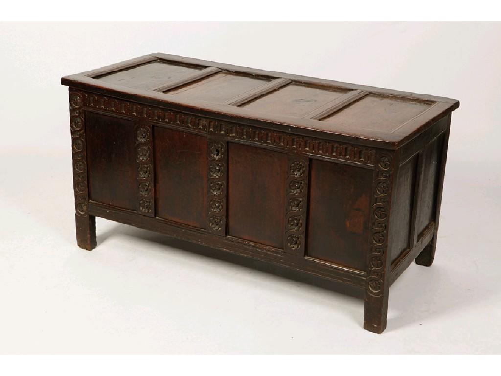 Appraisal: A CHARLES II OAK COFFER the rectangular four panel top