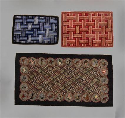 Appraisal: THREE AMERICAN HOOKED RUGS Each worked with over-under pattern x