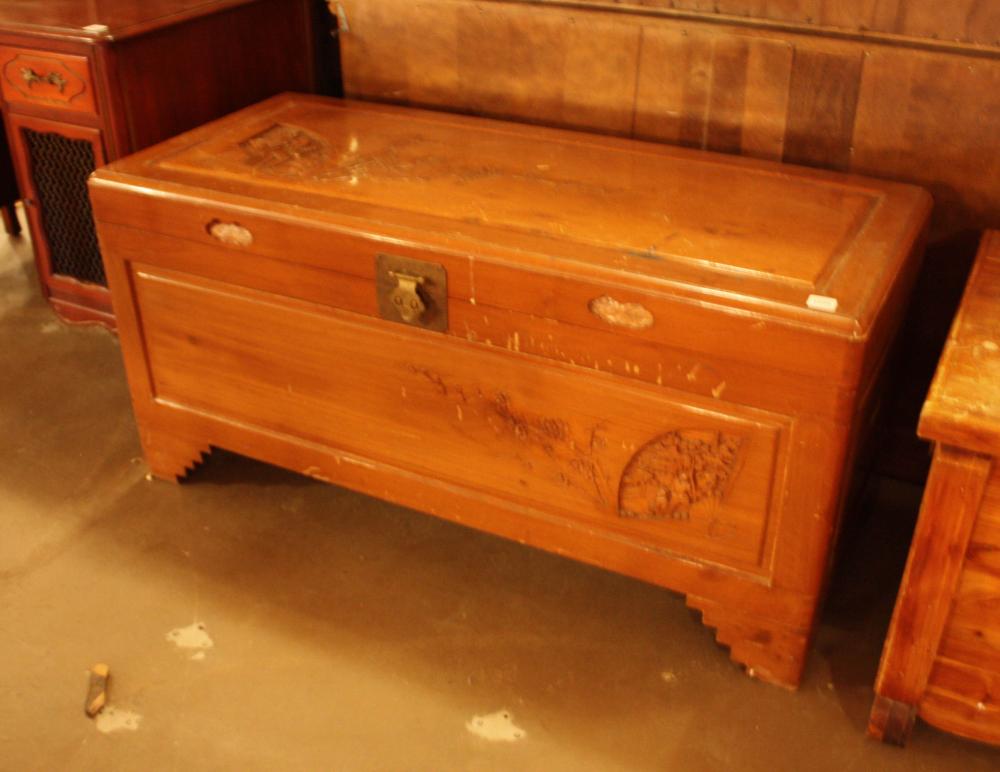 Appraisal: CHINESE EXPORT CAMPHORWOOD BLANKET CHEST lift top design with carving