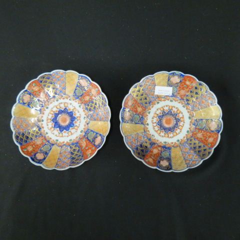 Appraisal: Pair of Imari Porcelain Plates scalloped th century excellent