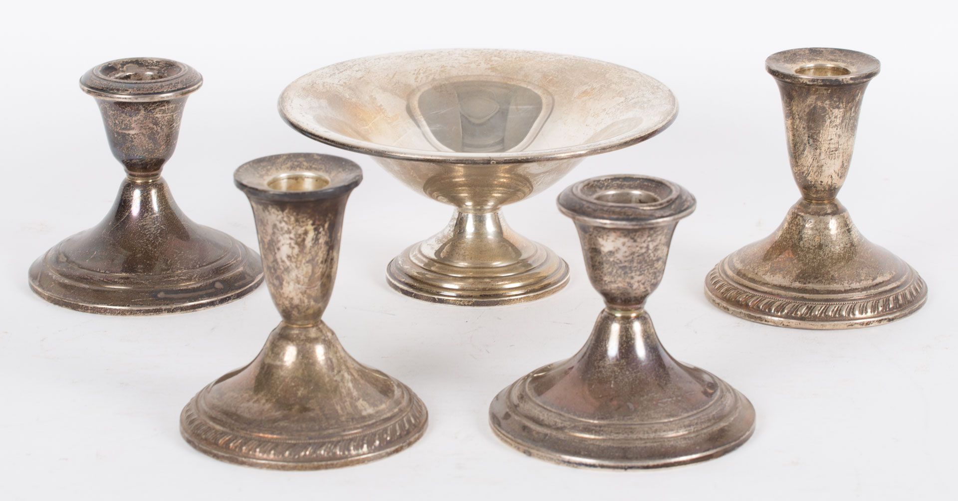 Appraisal: Assorted weighted sterling silver candlesticks two pairs of weighted sterling