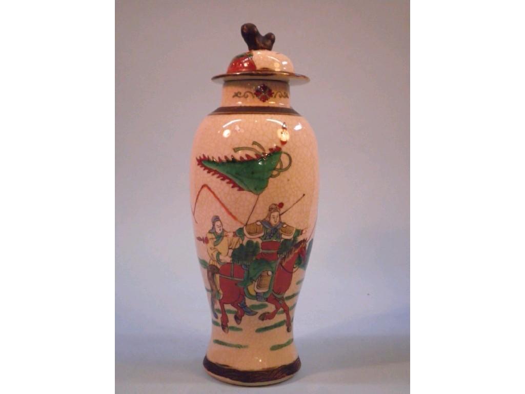 Appraisal: A Chinese porcelain crackle glaze vase and cover decorated in