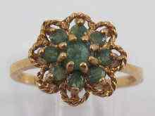 Appraisal: A yellow metal tests carat gold emerald ring