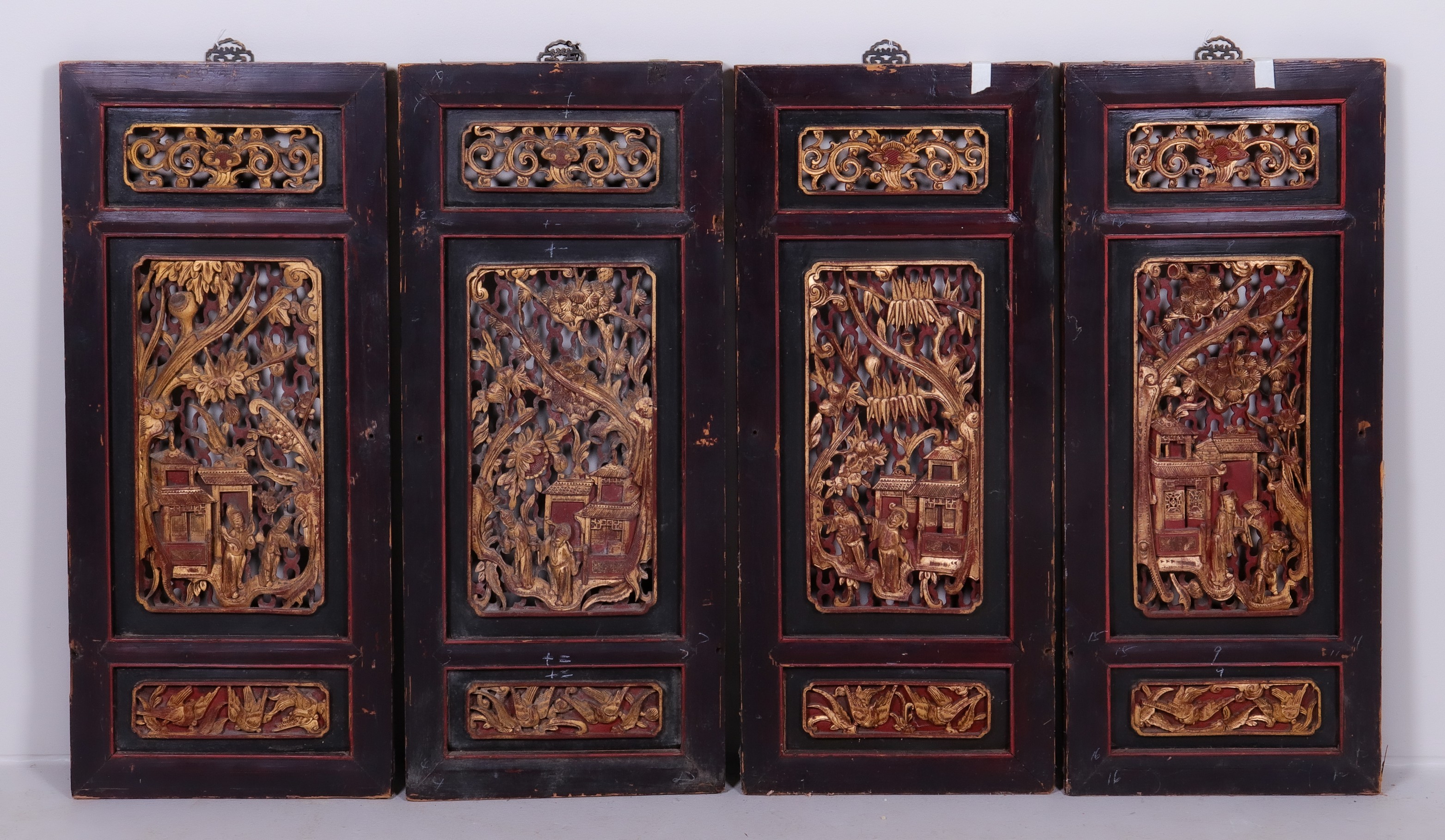 Appraisal: Chinese carved wood panels gilt figures in landscape - x