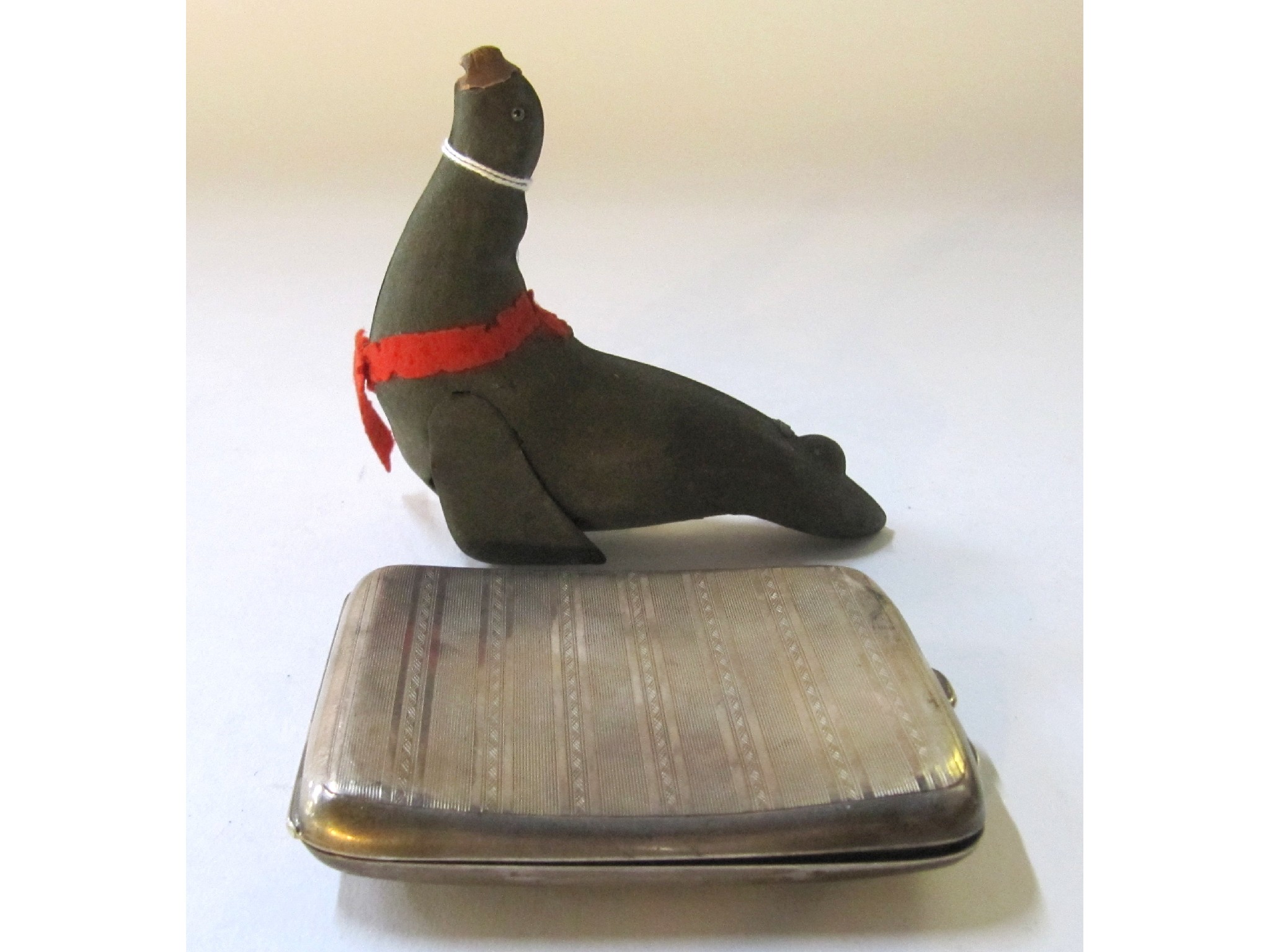 Appraisal: A lot comprising a Clockwork sea lion toy and a