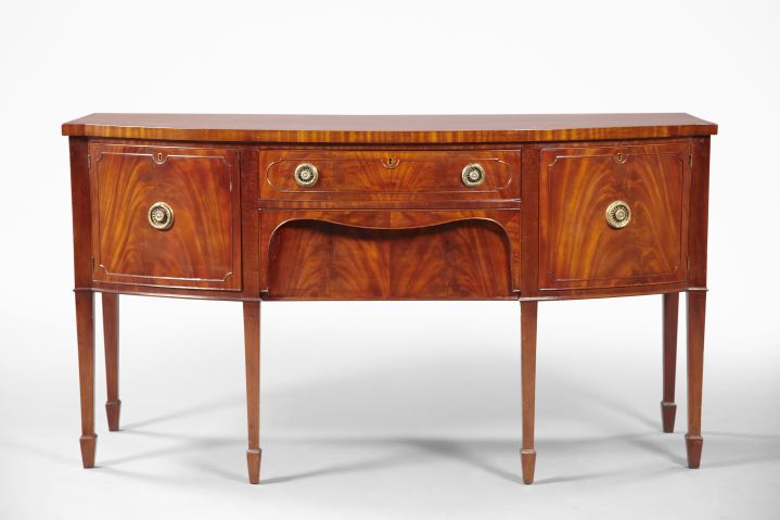 Appraisal: George III-Style Mahogany Bowfront Sideboard the banded and bowed top