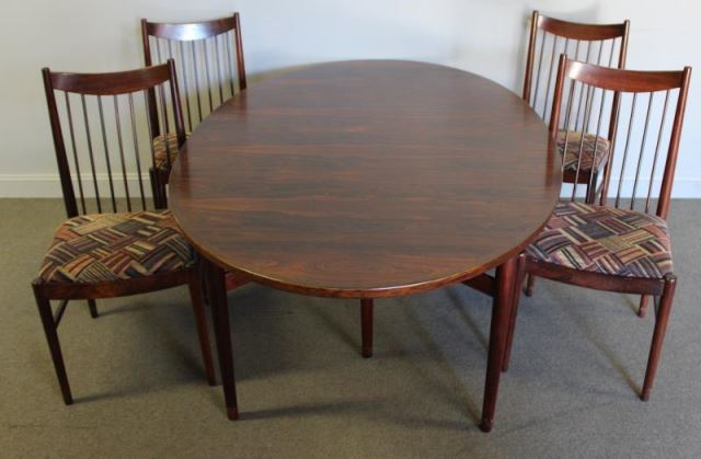 Appraisal: Midcentury Sibast Rosewood Dining Table and ChairsIncludes Danish angled spindle