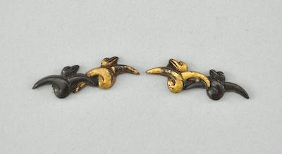 Appraisal: A Pair of Bird Design Menuki Mixed metal stylized bird